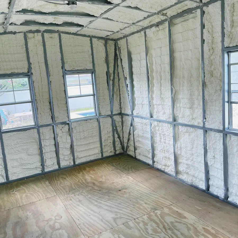 Closed-cell spray foam insulation applied to wall cavities in a residential project in Amarillo